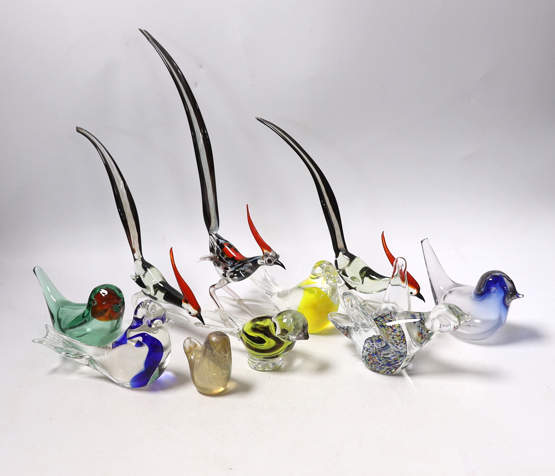 Ten Continental glass models of birds, some in the form of paperweights, tallest 26cm (to end of tail)